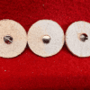 Three round felt pads with screws.