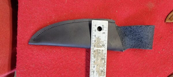 Leather knife sheath with measuring ruler.