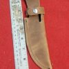 20230420_175651 - Copy Knife in sheath next to measuring ruler.