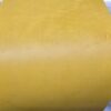 20241227_122330 Yellow textured surface of a rolled material.