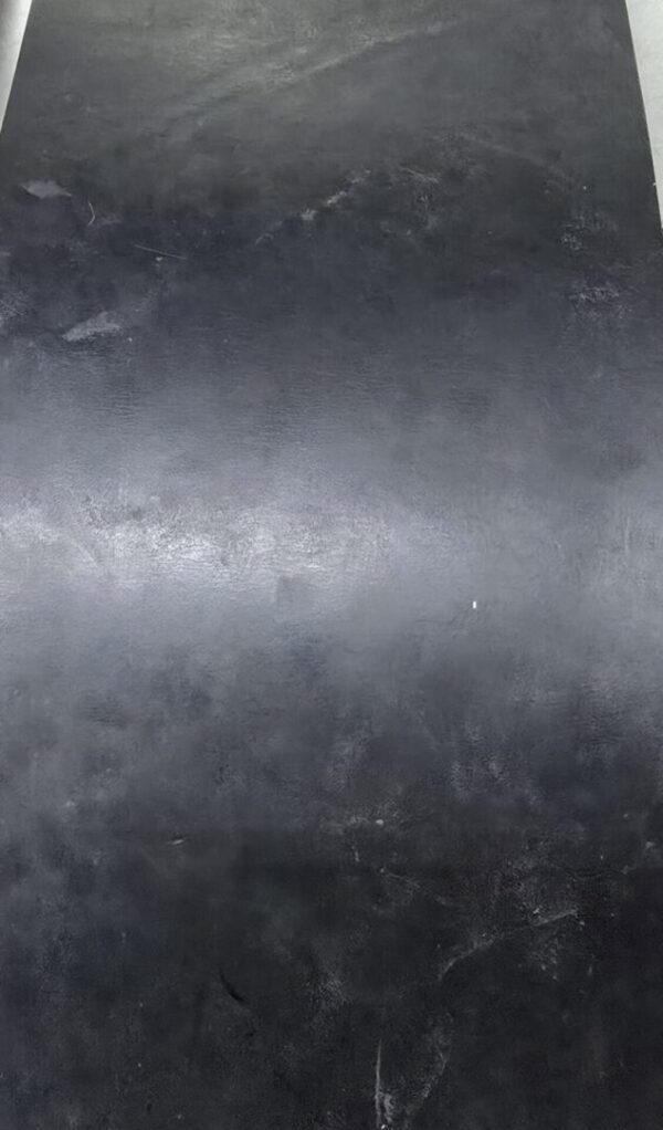20241227_122342 Black textured surface with subtle variations.