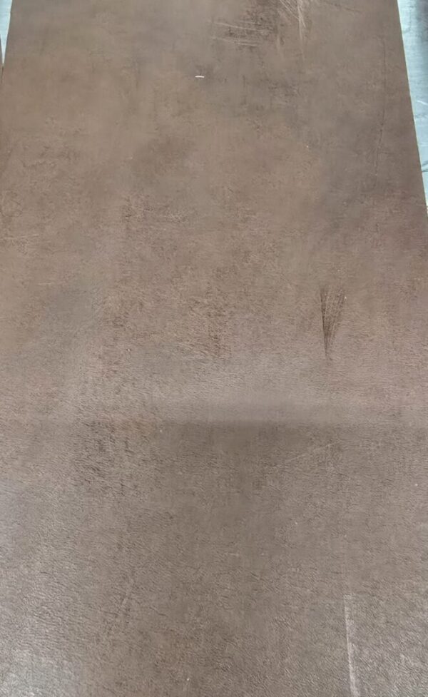 20241227_122349 Brown textured surface with subtle patterns.