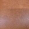 20241227_122355 Brown leather texture with subtle marks.