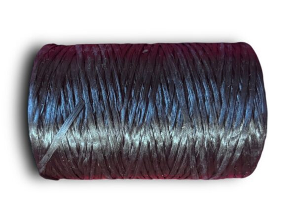 Colorful spool of twisted nylon thread.