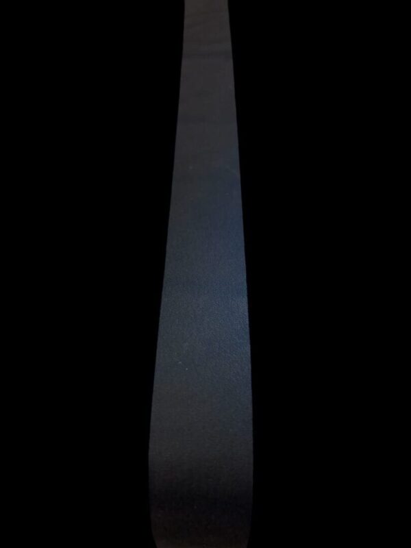 EWGI3498 Black fabric with a textured surface.