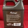 Fiebing's Neatsfoot Oil bottle on red background.