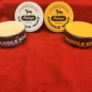 Containers of Fiebing’s saddle soap