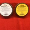 Two tins of Fiebing's saddle soap displayed.