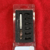 Pen with multiple black nibs in packaging.