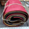 Rolled leather scraps, various colors.