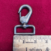 Metal clasp hook with measuring ruler.