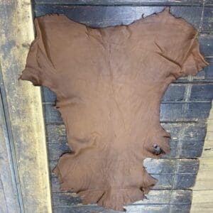 Cowhide on wooden planks