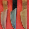 One black and two brown knife sheaths