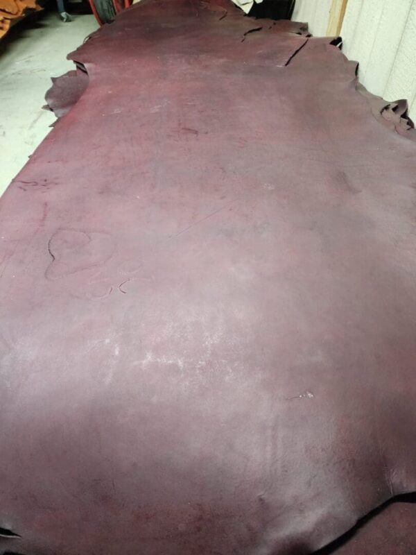 20240215_180107 - Copy Large sheet of dark brown leather material.