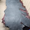 Large piece of leather on a table.