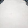 Large sheet of light-colored leather material.