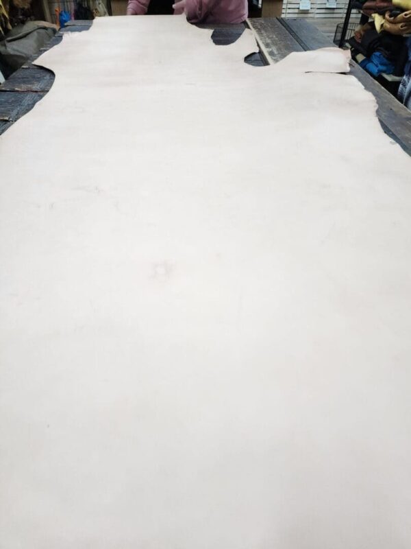 Large sheet of light-colored leather material.