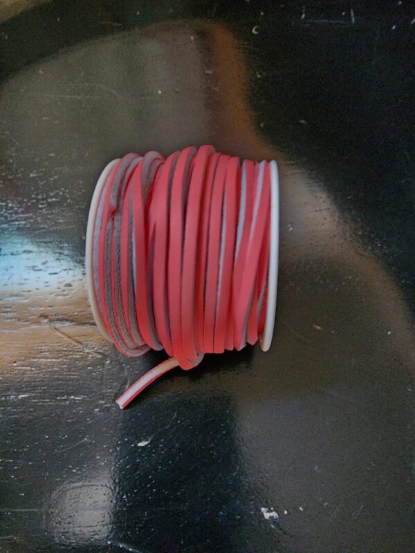 Roll of red and white insulated wire.