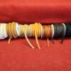 Spools of various colored leather laces.