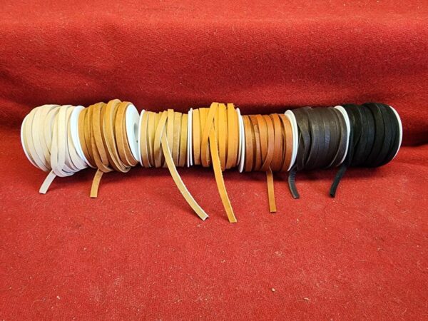Spools of various colored leather laces.