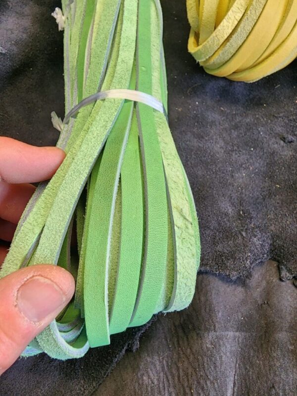 Green and yellow foam strips held together.