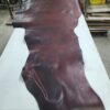 Large piece of dark brown leather.