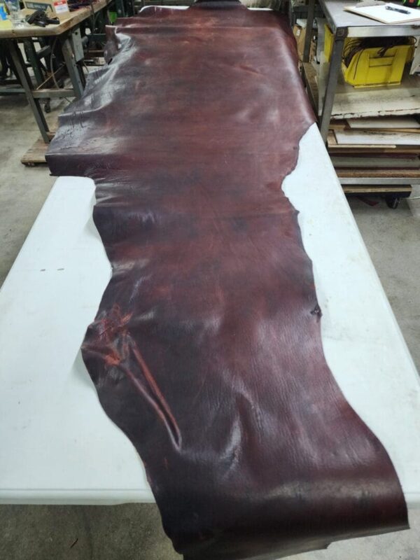 Large piece of dark brown leather.
