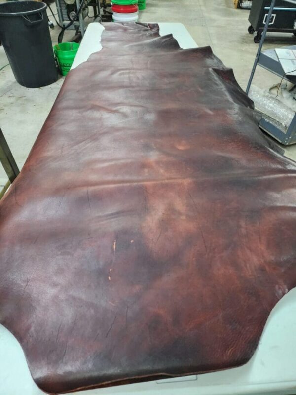 Large piece of dark brown leather.