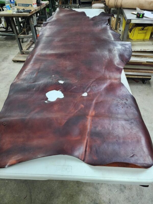 Large piece of dark brown leather.