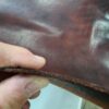 Close-up of brown textured leather material.