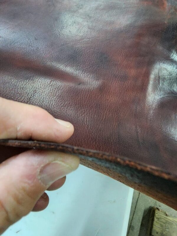 Close-up of brown textured leather material.