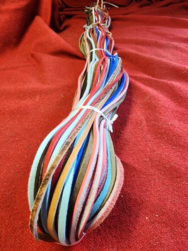 Colorful strips of leather arranged neatly.