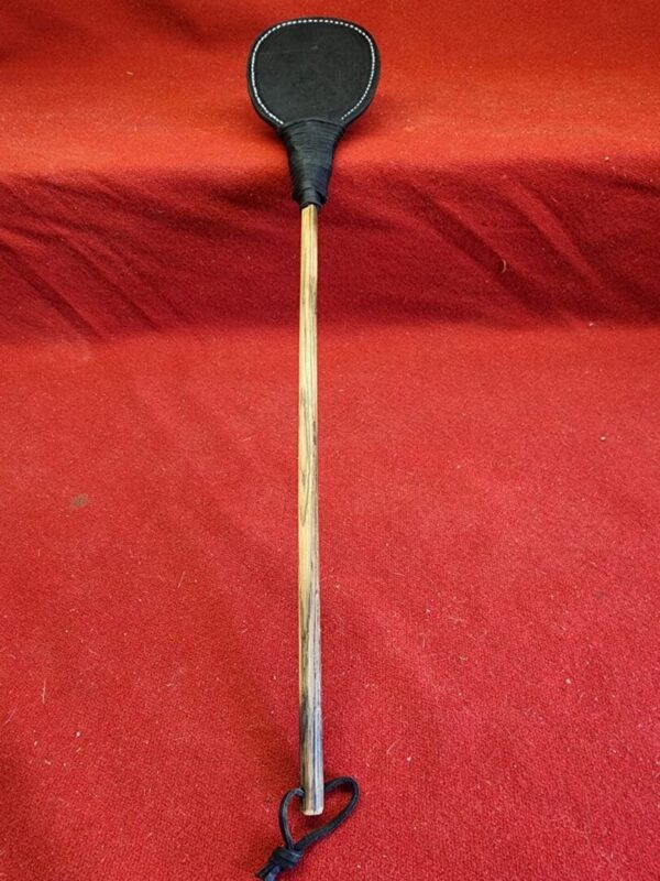 20240629_134422 Black paddle on a wooden handle.