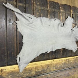 IMG_2012 Animal hide on wooden surface.