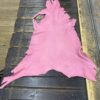 IMG_2064 - Copy Pink leather hide on wooden table.