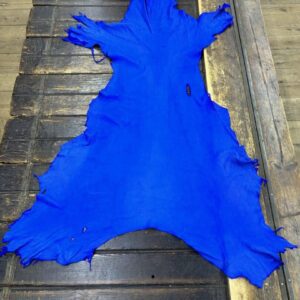 IMG_2080 Bright blue leather on a wooden surface.