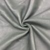 Gray leather fabric in a swirling pattern.