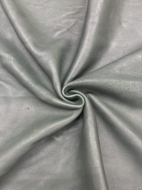 Gray leather fabric in a swirling pattern.