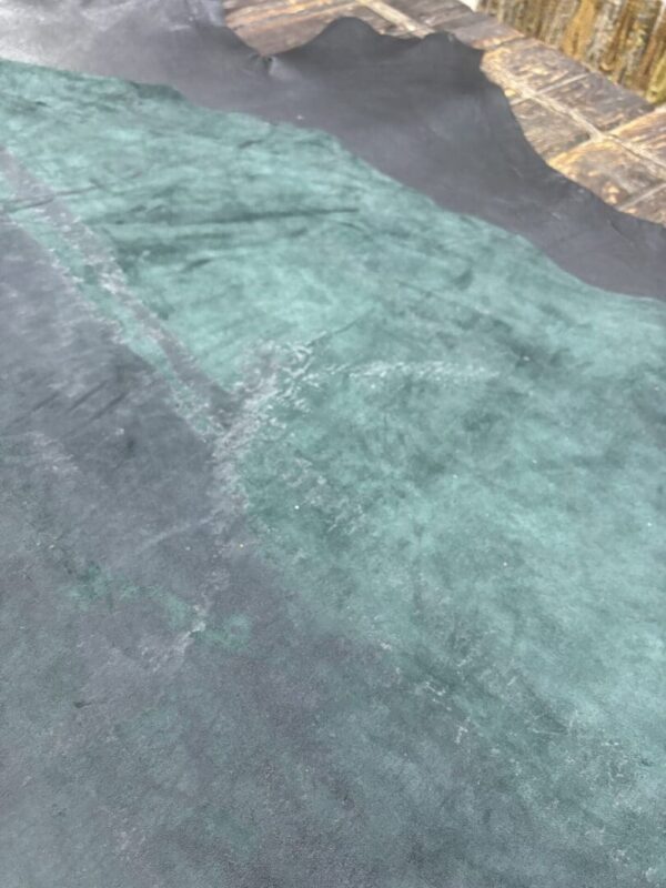 Green and black leather material.