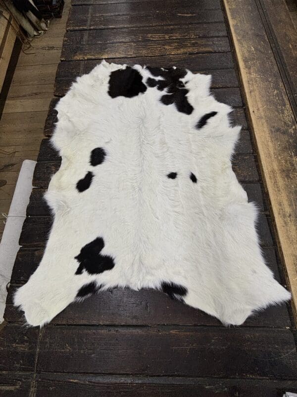 Hair on Calf Hide Rug, Color Black and White