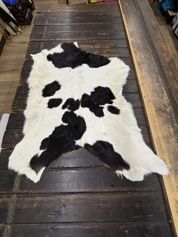 Hair on Calf Hide Rug, Color Black and White