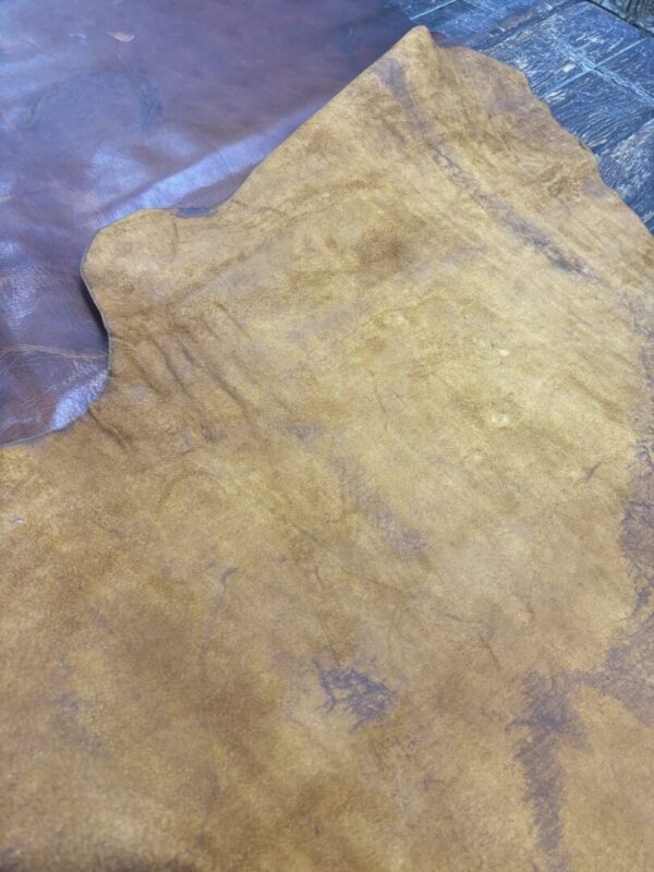 Brown leather with a distressed finish.