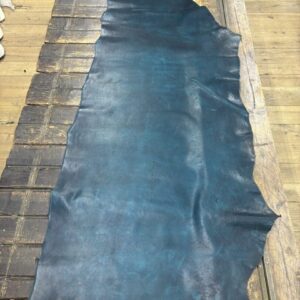 IMG_2689 Teal leather on wooden surface.