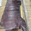 IMG_2710 Large piece of brown leather on wood.