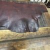 IMG_2712 Brown leather on a wooden table.