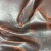 IMG_2714 Brown leather with a wrinkled texture.