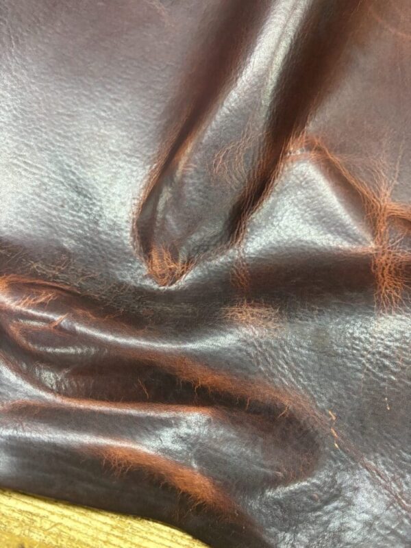IMG_2714 Brown leather with a wrinkled texture.