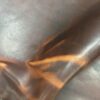 Close-up of brown leather texture.