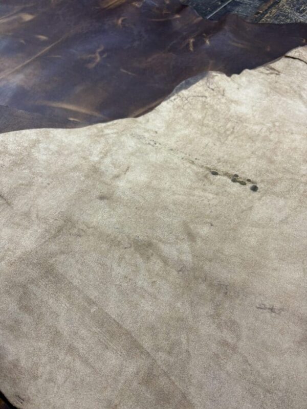 Beige leather with brown leather overlay.