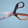 Black and orange Fiskars Pro scissors.